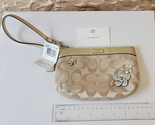 Coach: Beige Signature Zip Wristlet NEW WITH TAGS