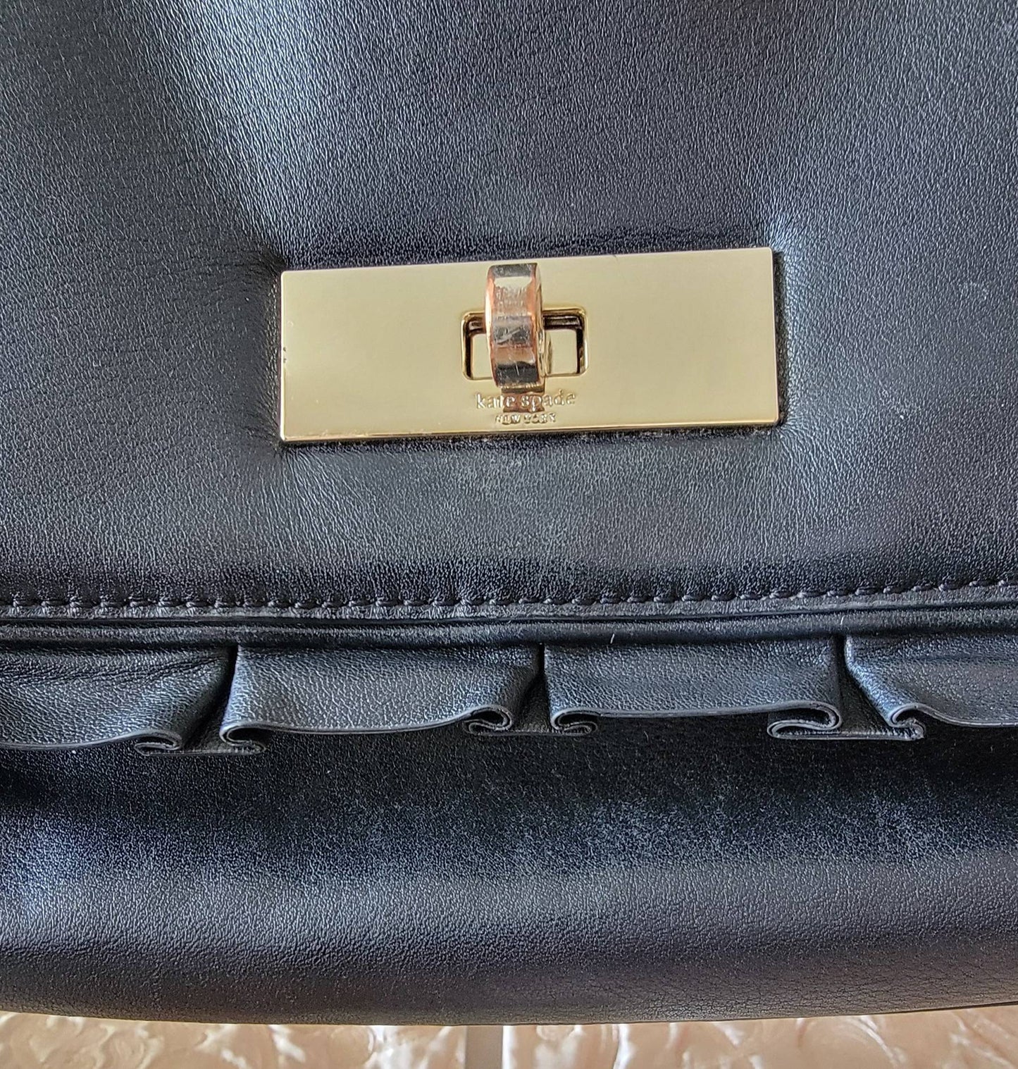 Kate Spade: Black Leather Handbag Ruffle Detail
