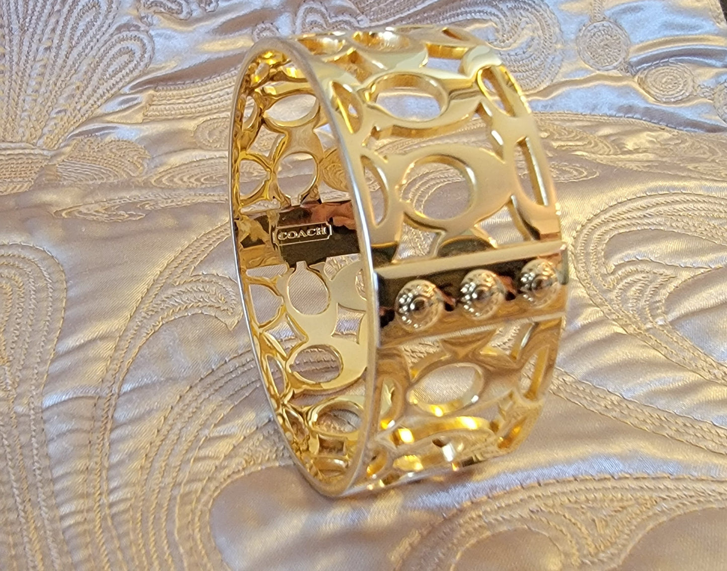 Coach: Gold-tone Bangle Bracelet