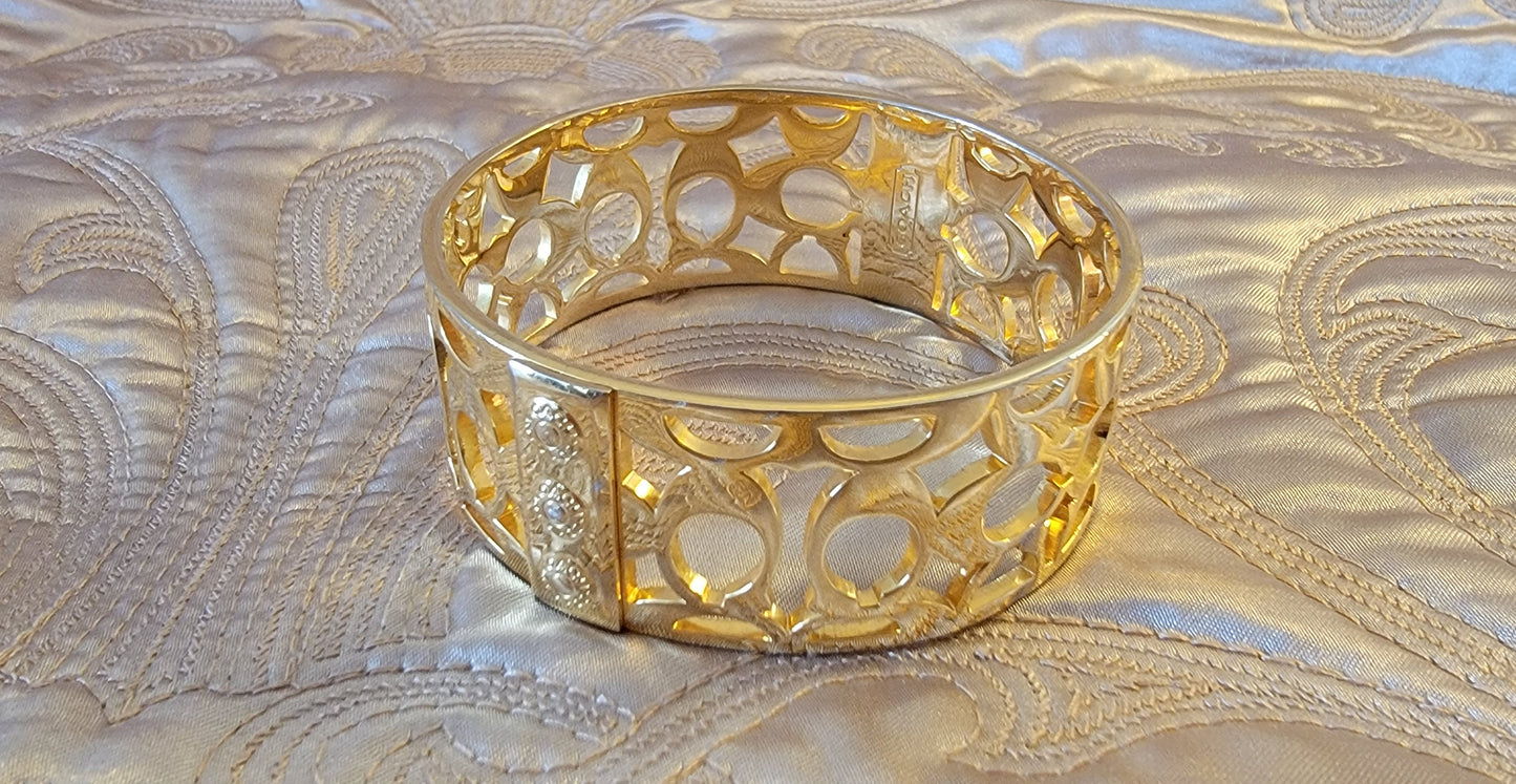 Coach: Gold-tone Bangle Bracelet