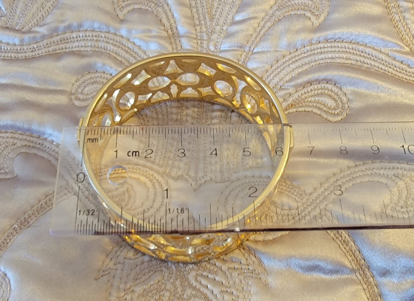 Coach: Gold-tone Bangle Bracelet